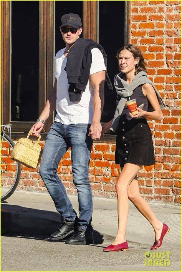 Alexander Skarsgård and Alexa Chung Attend Glastonbury Festival