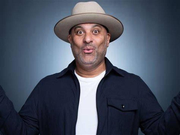 What is Russell Peters' wife's name? Comedian gets married with several